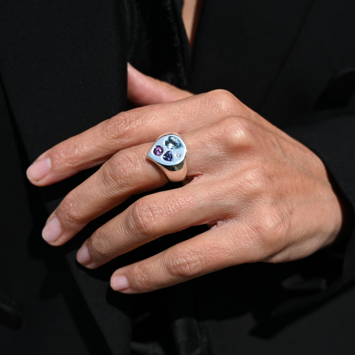 Silver ring with flat top and playfully placed semi precious stones